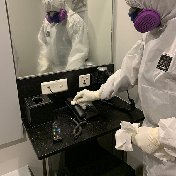 Disinfection Service | Hotel Room Phone Wipe Down